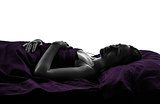  woman in bed sleeping lying on back silhouette