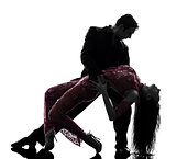 couple man woman ballroom dancers tangoing  silhouette