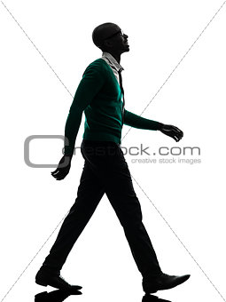 african black man walking looking up smiling silhouette silhouet