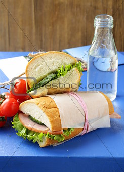 snack sandwiches (panini) with vegetables and ham