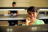 College library and female student, black woman looking at camer