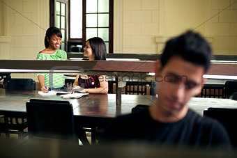 Young people at school, students studying in college library
