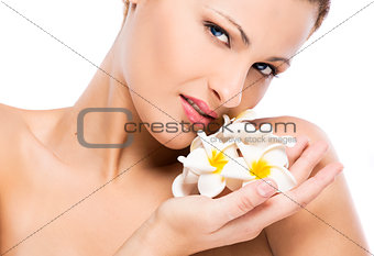 Beautiful woman holding flowers