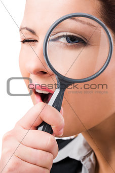 Business holding a magnifying glass