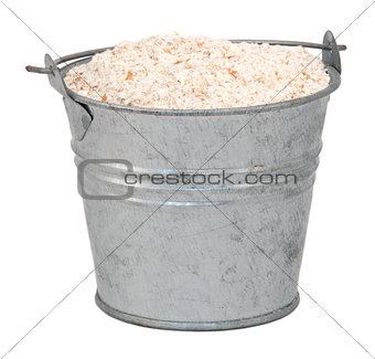 Wholemeal / wheatmeal / brown flour in a miniature metal bucket