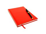 Red diary and pen on a white