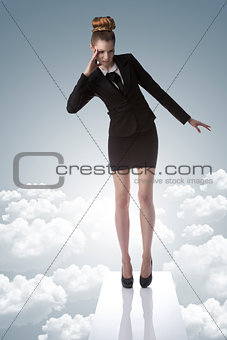 worried business lady on trampoline