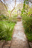 Beautiful Lush Park Walkway and Antique Well