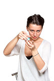 Woman opening a box with contact lenses
