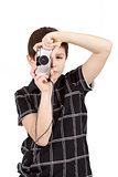 small boy photographing vertical with digital camera
