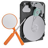 Hard drive, screwdriver and magnifying glass