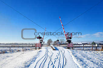 railway crossing in winter