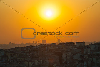 Sunset over a large cityscape