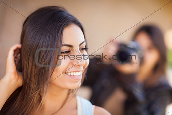 Young Adult Mixed Race Female Model Poses for Photographer