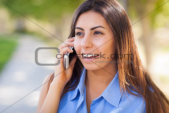 Mixed Race Young Adult Woman Using Her Cell Phone