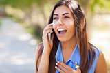 Mixed Race Young Adult Woman Using Her Cell Phone