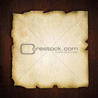 Old paper on wood background