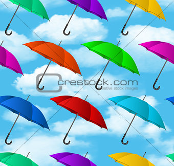 Seamless colorful umbrellas background.