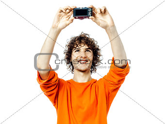 young man holding camera photographing portrait