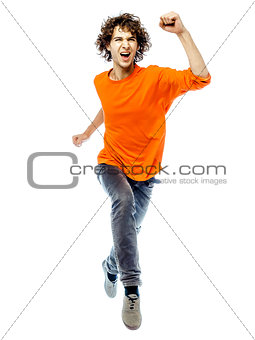 young man running  screamming happy front view