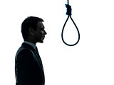 business man portrait profile standing in front of  hangman noos