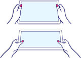 Woman's hands keeps tablet