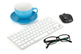 Coffee cup, keyboard, mouse and glasses