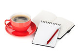 Red coffee cup and office supplies
