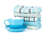 Kitchen towels and coffee cup