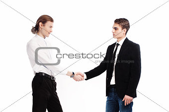 two fashionable young men greet each other
