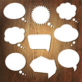 Abstract Speech Bubble On Wooden Background