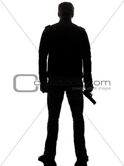 rear view man killer policeman holding gun silhouette