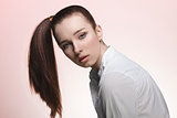 young woman with smooth ponytail