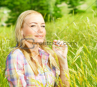 Cute girl on wheat field