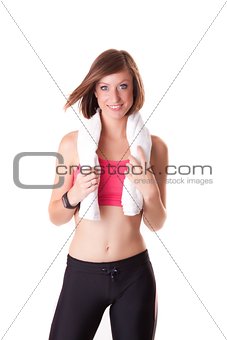 young beautiful sport woman standing with a towel isolated on wh