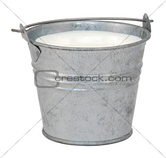 Milk in a miniature metal bucket