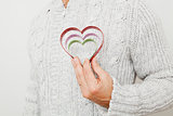 Heart symbols held in hand