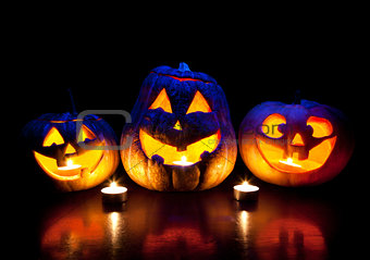 Halloween pumpkins glowing inside