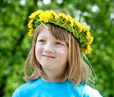 child with a flower wreath