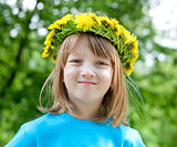 child with a flower wreath
