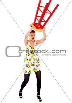 Frustrated woman breaking stool