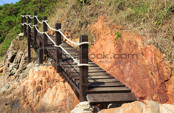 Wooden footbridge near the sea   