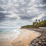 Tropical beach with dramatic sky