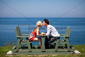 Romantic couple sitting on the bench
