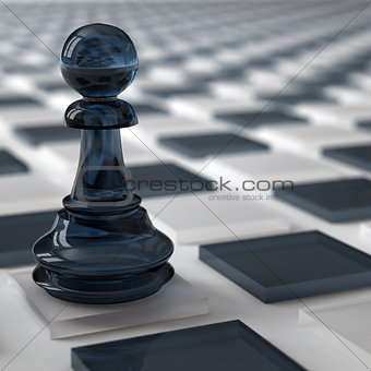 glass pawn of dark color on a chess cells