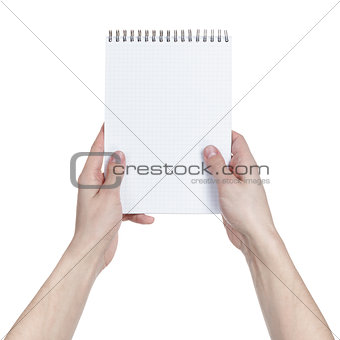 adult man hands holding notebook on a spring