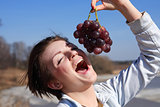 Girl Eating Grapes