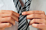 knotting a tie