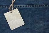 Price tag over jeans