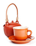 clay kettle and cup with saucer